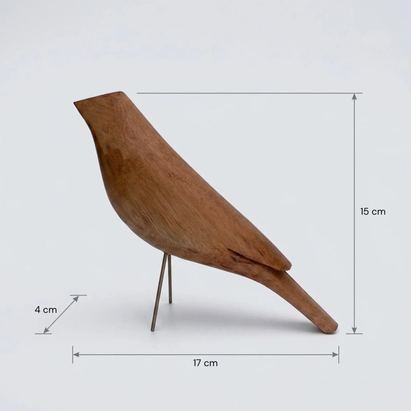 Escultura pássaro de madeira com monstera e vaso de terracota artesanal