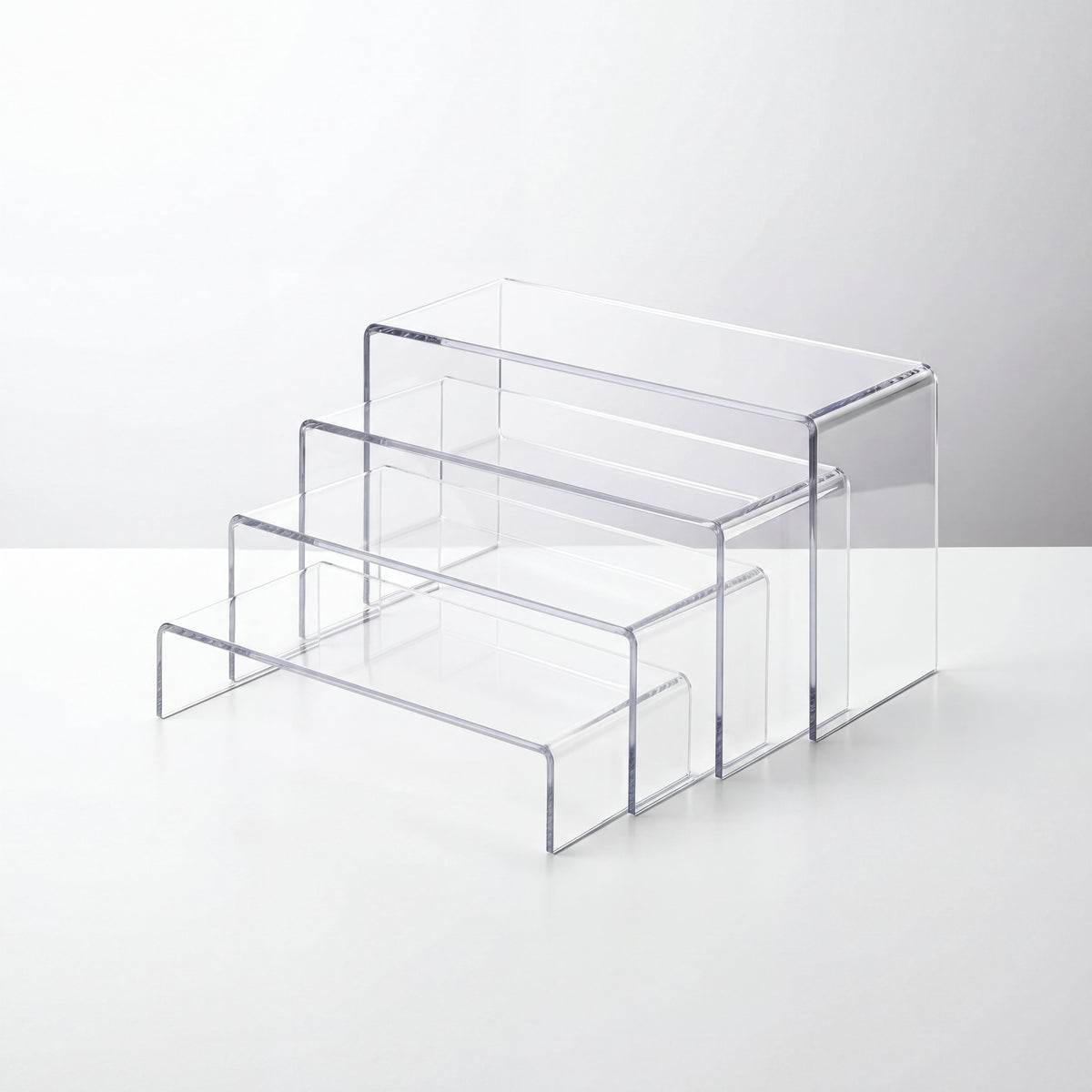 Kit de expositores de acrílico transparente em alturas diferentes para organização e exposição de produtos