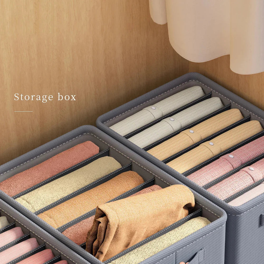 Organizador Vertical de Roupas na prateleira do closet com tricôs