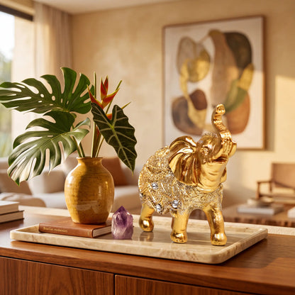 Escultura elefante da sorte dourado em bandeja de mármore com cristal decorativo