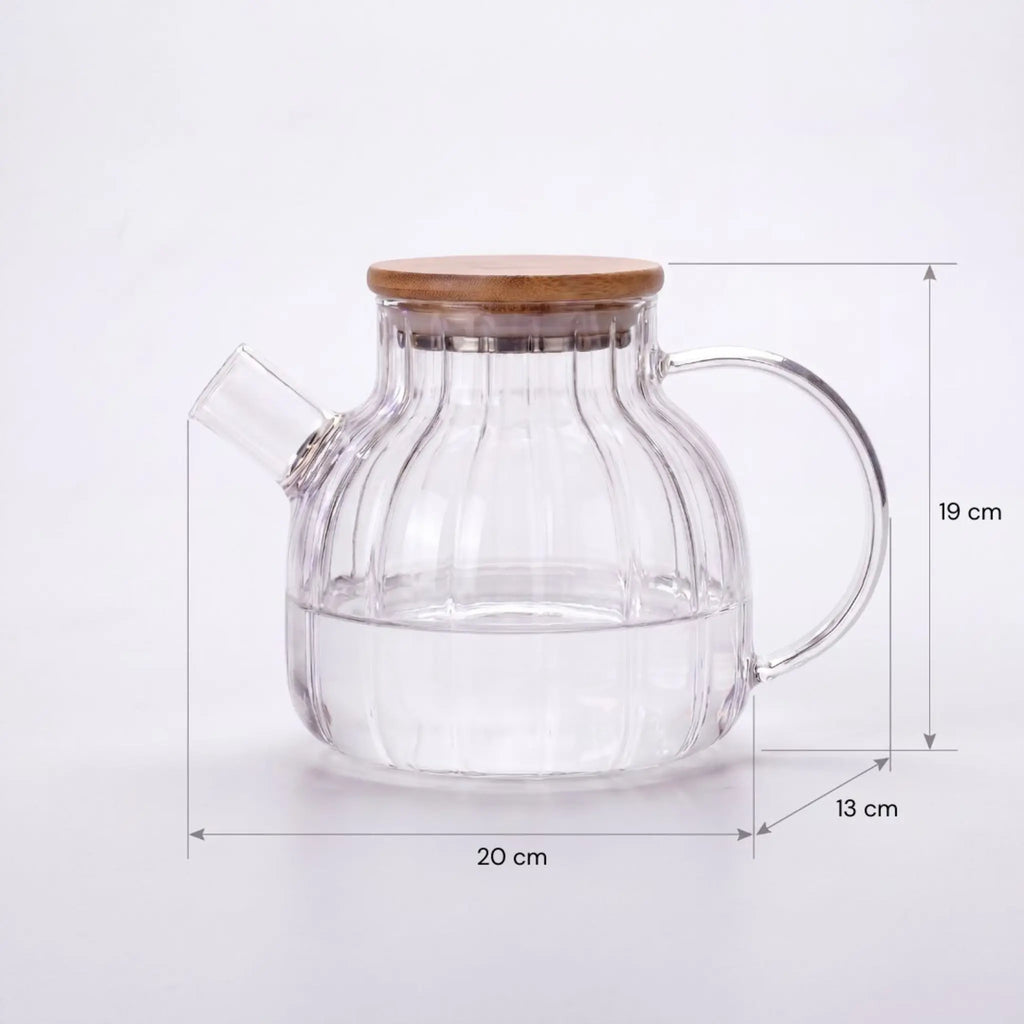 Bule de vidro ao fogo com dimensões: 19 cm de altura e 20 cm de comprimento e 13 cm de largura