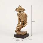 Escultura decorativa Silêncio e Paz dourada com linhas de dimensões: 12,5 × 11,5 × 34 cm